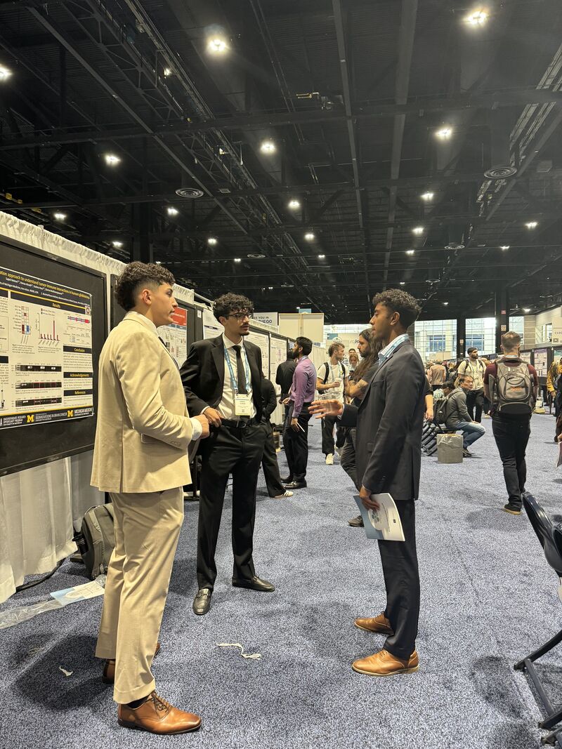 Sajed in discussion at SfN 2024